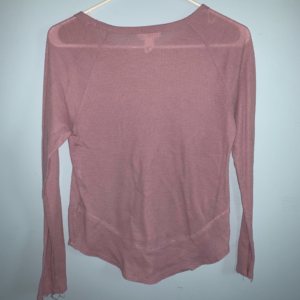 Light purple long sleeve shirt.